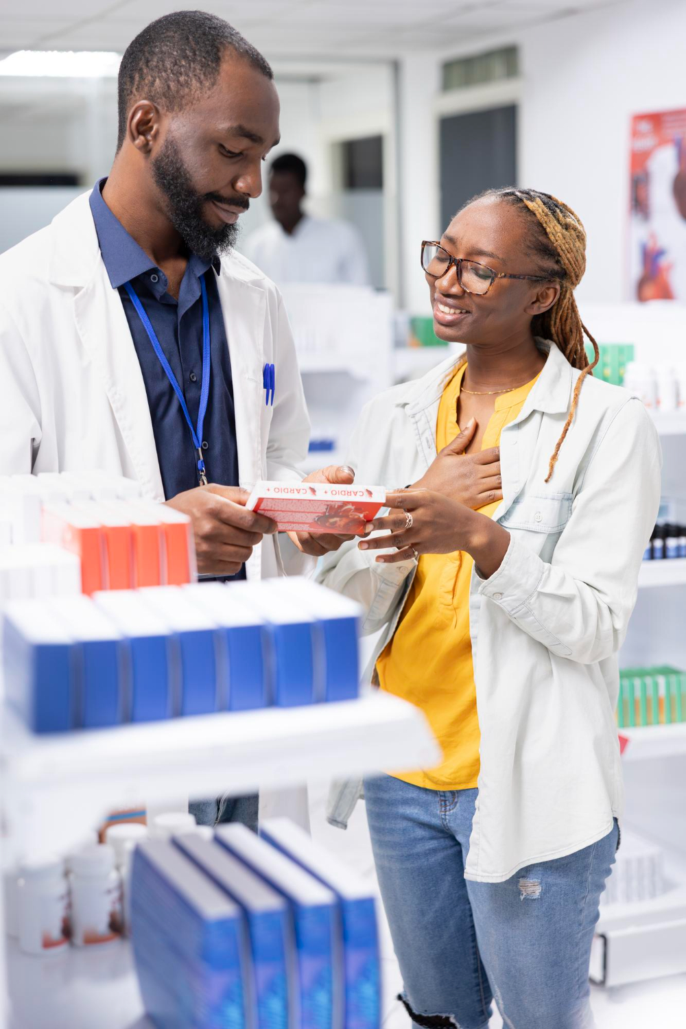 MPharmacy pharmacist advising a customer